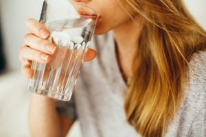 Girl drinking glass of water