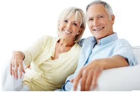 Older couple smiling and hugging