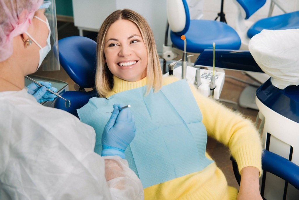 patient in richardson tx learning about biomimetic restorative dentistry