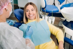 patient in richardson tx learning about biomimetic restorative dentistry